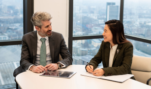 Two blumont employees in meeting room